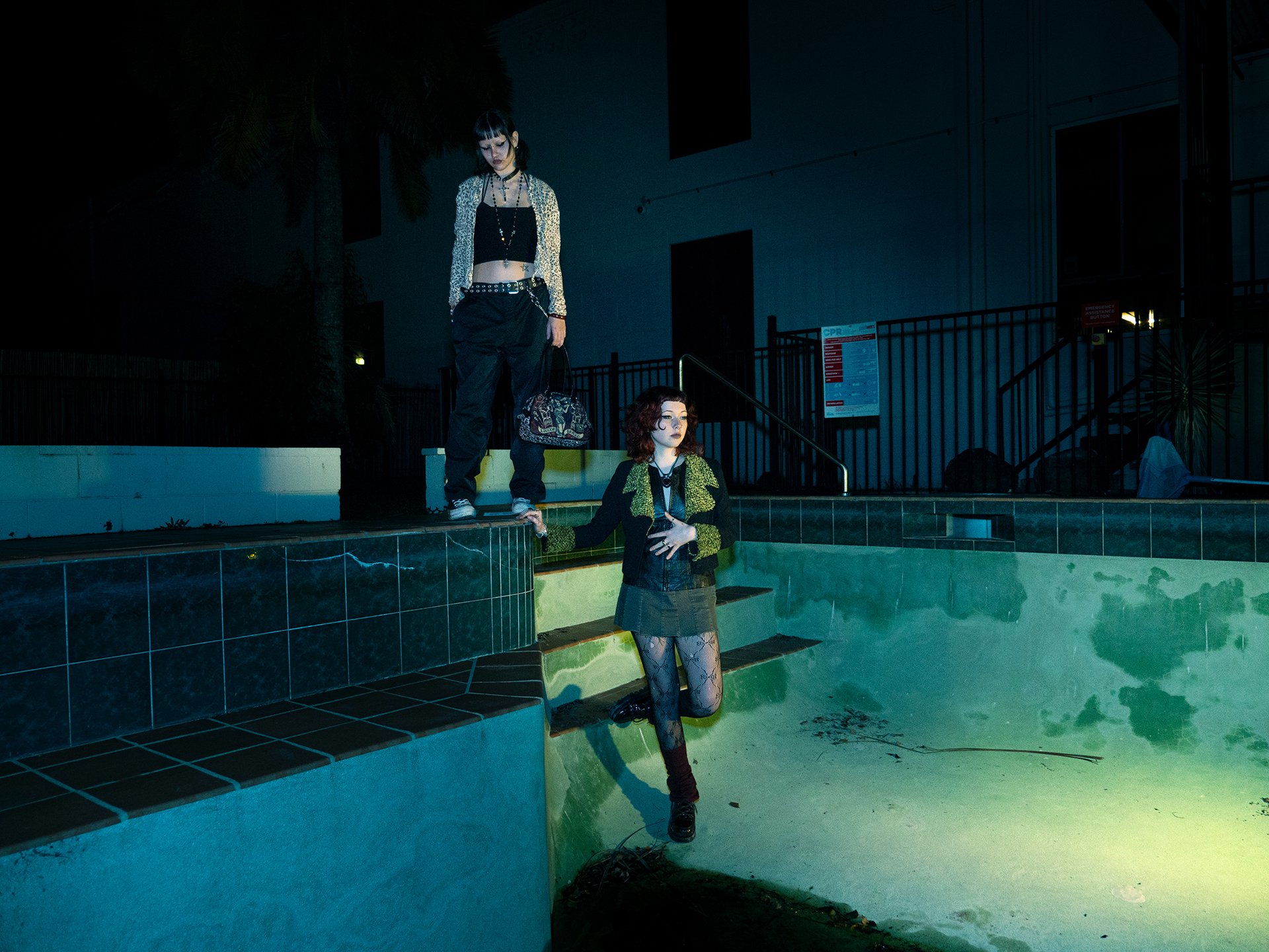 Portrait of Ellie and Tea in a pool by Jack Gamble Photography and Video in Brisbane, QLD